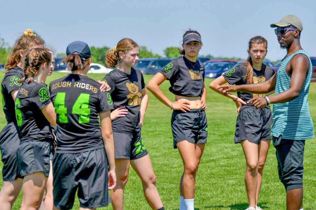 Khalif El-Salaam coaches a HS girls ultimate team.